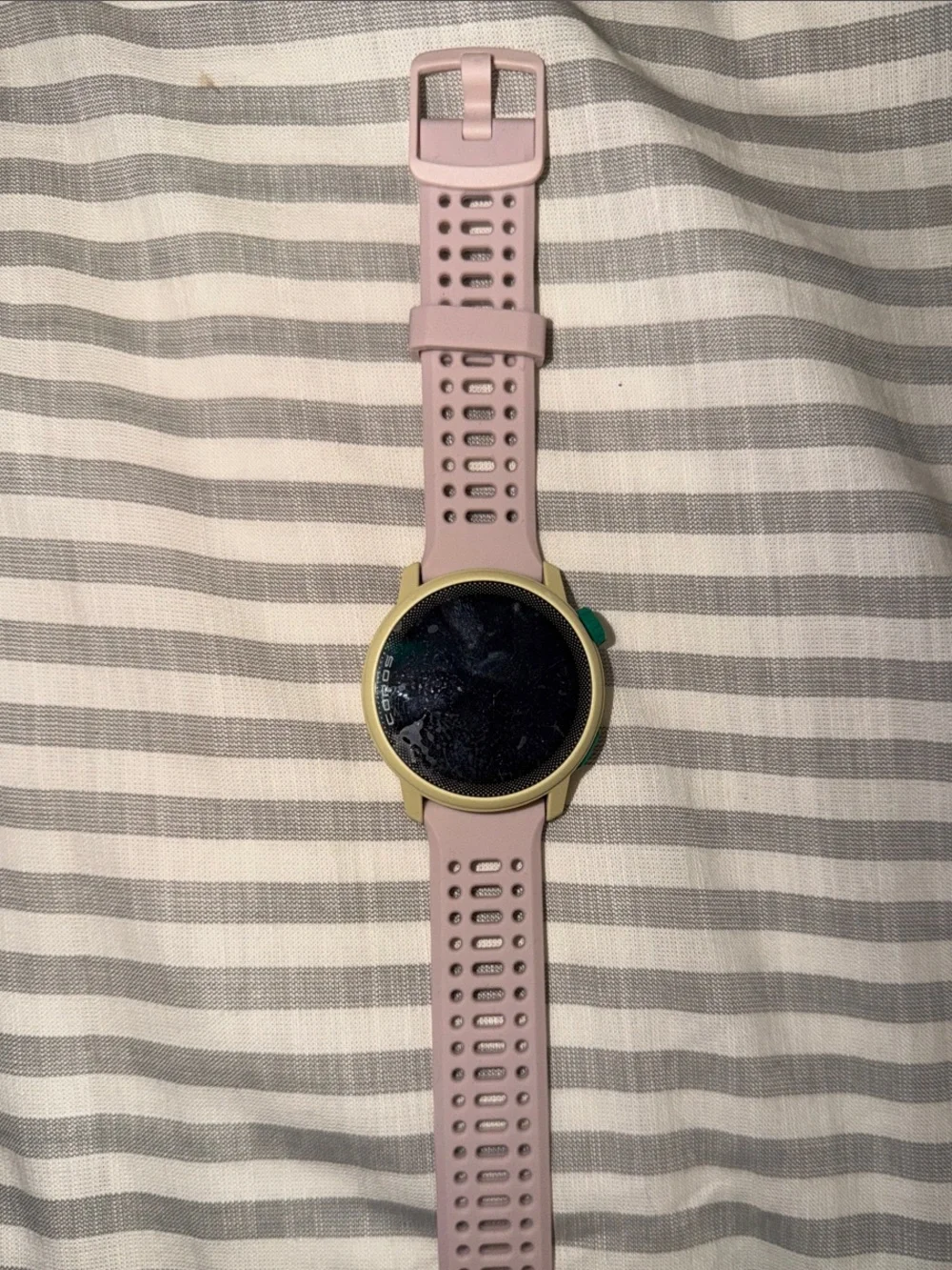 Coros sports watch with pink band